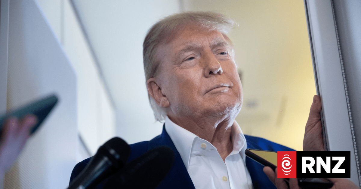 US President Donald Trump condemns video showing Obamas as apes after removal