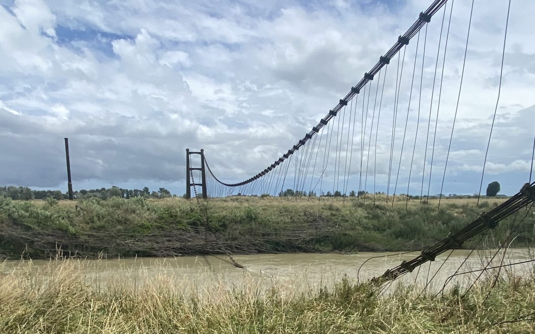 The bridge's cabling failed and sagged into the river after strong winds on New Year's Eve.