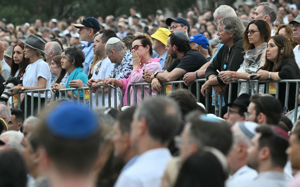 Mourners attend the memorial held for the victims of the shooting at Bondi Beach in Sydney.