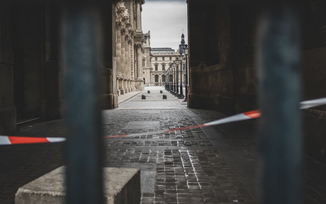 National police tape in front of the Louvre Museum, closed after a burglary in Paris, France, on October 19, 2025.