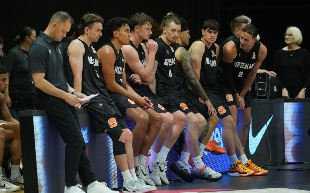 The Tall Blacks sit dejected after their loss during the FIBA World Cup Qualifier against Australia.