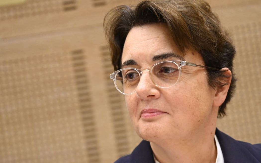 President of the Louvre Museum Laurence des Cars looks on prior to the start of a hearing before the Senate's culture committee at the French Senate in Paris on October 22, 2025. Laurence des Cars has not made any public statement since the theft on October 19, 2025. Des Cars, who became the first woman to run the Louvre in 2021, is expected to be questioned about security at the Apollo Gallery, which houses the royal collection of gems. The museum on October 21, 2025 hit back at criticism that the display cases protecting the stolen jewellery were fragile, saying they were installed in 2019 and "represented a considerable improvement in terms of security". (Photo by Bertrand GUAY / AFP)