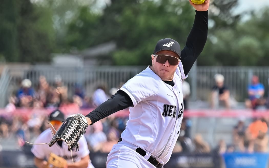 Black Sox pitcher Liam Potts (21 years) in action during the WBSC Mens Softball World Cup Final against Venezuela.