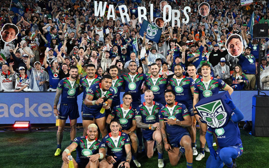 Warriors team photo with fans after beating Cowboys, NRL Magic Round.