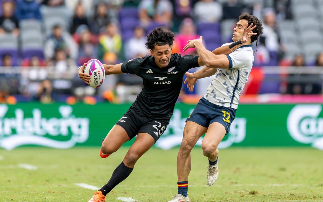 Vai puts in a bit fend against Spain in the HSBC Hong Kong Sevens at Kai Tak Stadium on March 28, 2025.
