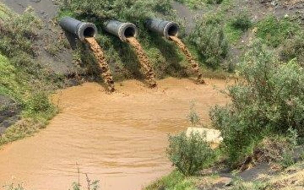 Discharge from pipes Taharoa Ironsands.