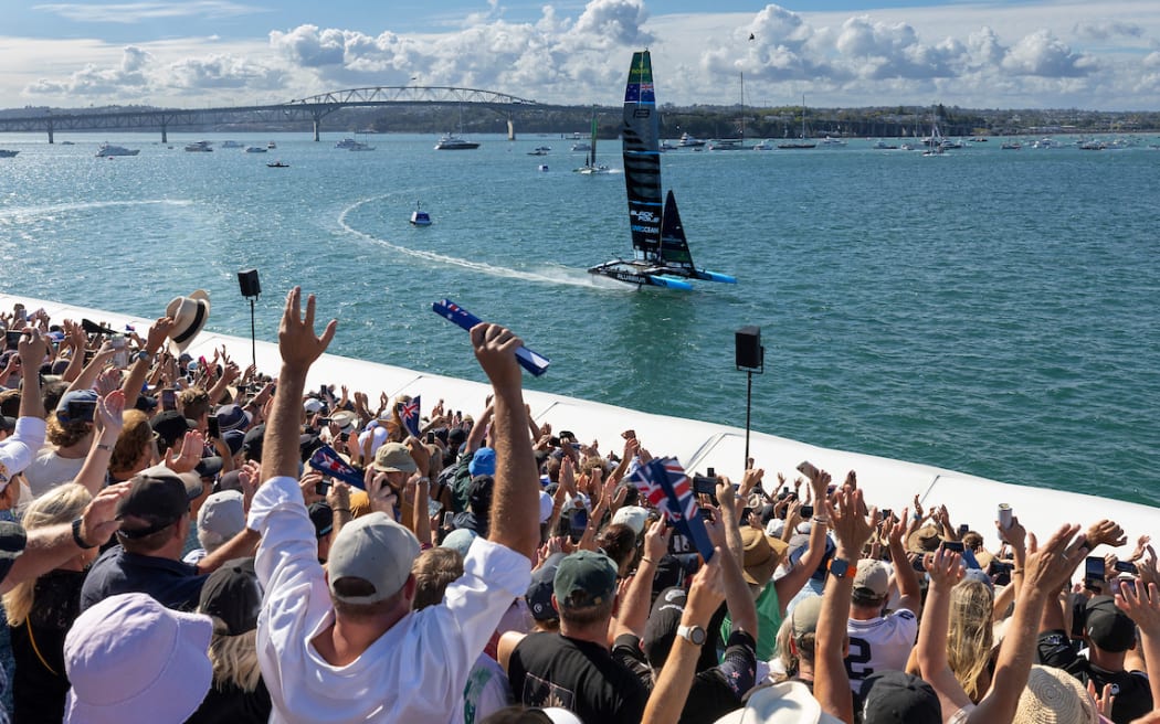The Black Foils helmed by Peter Burling cross the finish line during Race 4 on Race Day 1 of The Rolex SailGP 2025 Championship.