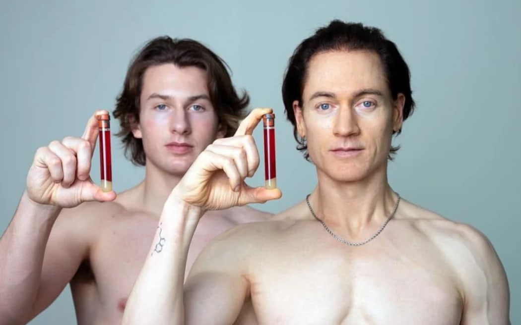 Bryan Johnson and his son.