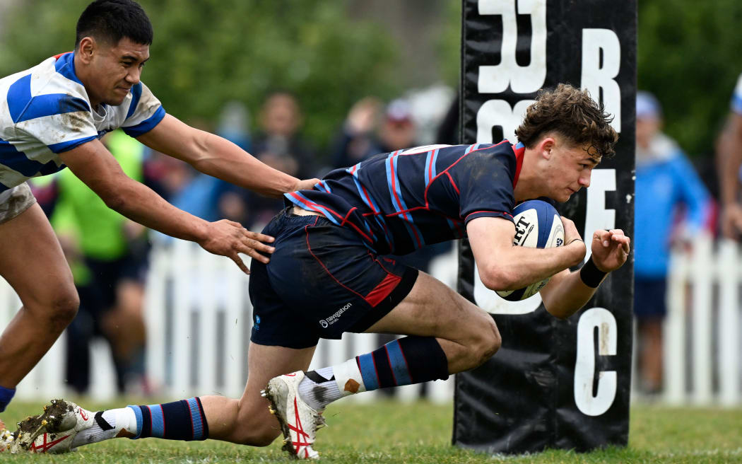 Sacred Heart first five-eighth Rico Simpson scores a try during the Saint Kentigern College vs Sacred Heart College First XV Schools Rugby Union 1A Final in 2023.