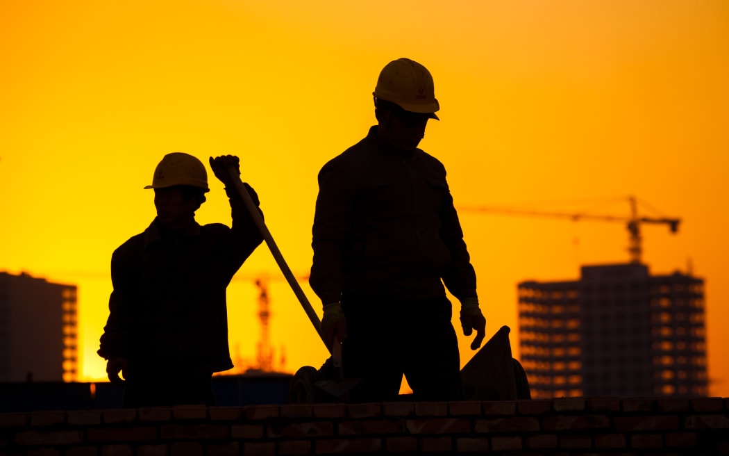 silhouette of construction worker