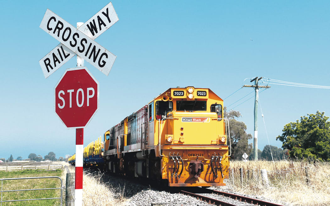 BACK ON TRACK: The first working log train leaves Wairoa with logs for Napier Port on Sunday