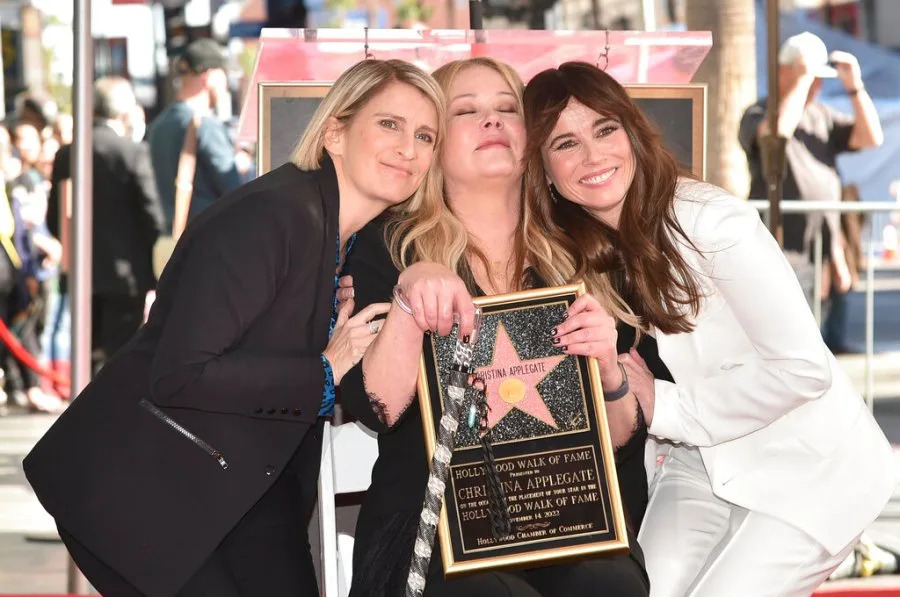 Liz Feldman, from left, Christina, Applegate and Linda Cardellini pose during a ceremony honoring Applegate with a star on the Hollywood Walk of Fame on Monday, Nov. 14, 2022, in Los Angeles. (Photo by Richard Shotwell/Invision/AP)