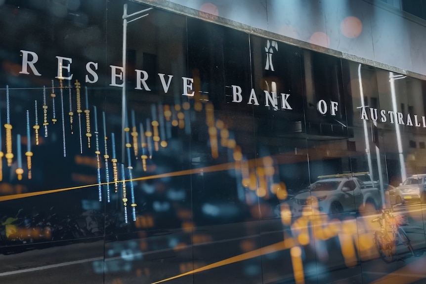 The RBA sign on side of a building, overlaid with a stock market chart