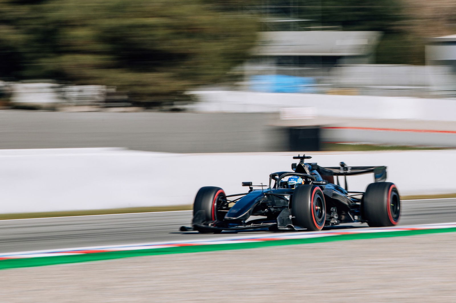 What put Aston Martin four months behind F1 schedule