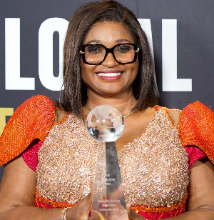 Maame Efua Houadjeto with her award at the ceremony