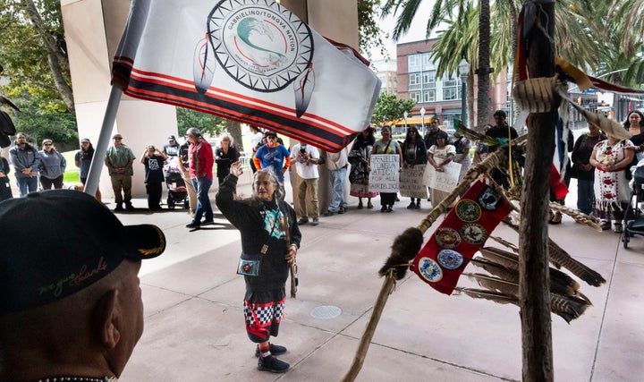 Virginia Carmelo, from the Gabrielino/Tongva Nation, speaks during a ceremony in front of city hall for Indigenous Peoples Day in Anaheim, CA in October.