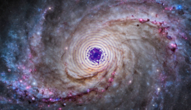 An illustration shows dark matter powering the heart of a spiral galaxy