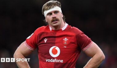 Aaron Wainwright for Wales with his hands on his hips