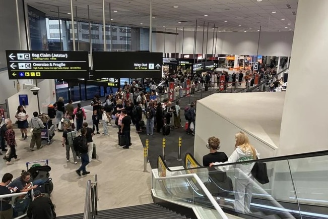 A crowded airport or people waiting.