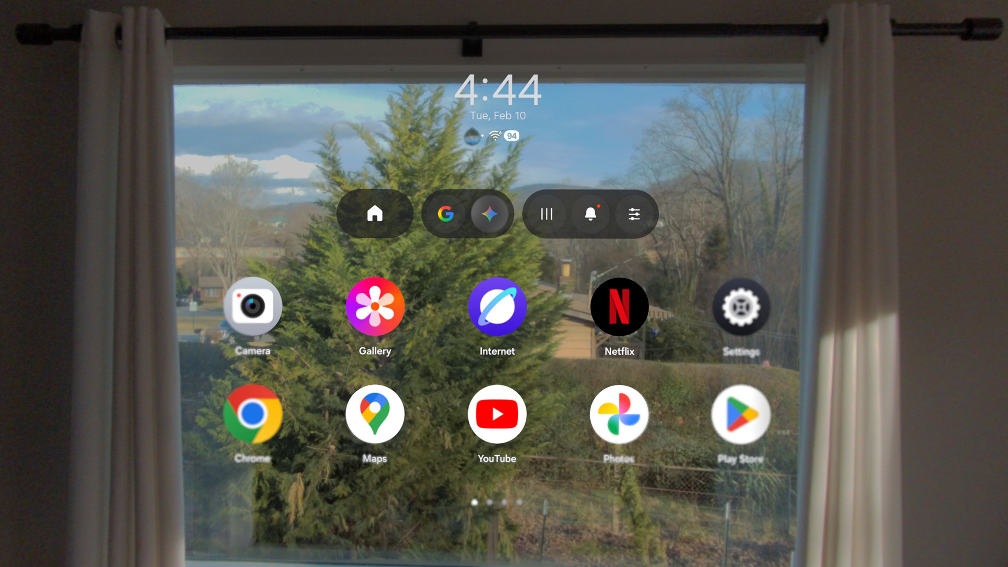Viewing the Android XR app drawer on a Galaxy XR with a window in the background