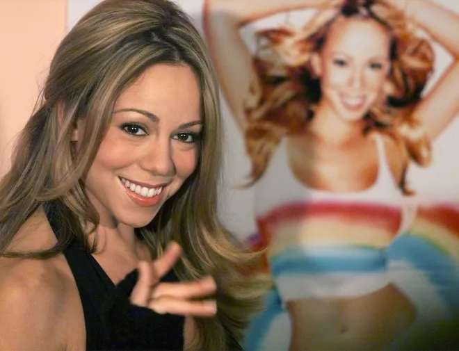 Singer Mariah Carey poses during a photocall in a Madrid hotel November 16, 1999.