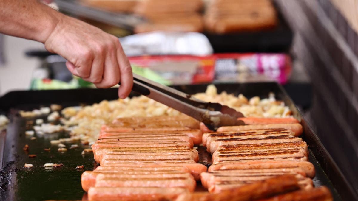 ANZ Bank charges staff $10 for sausage sizzle as ‘welcome back to the office’