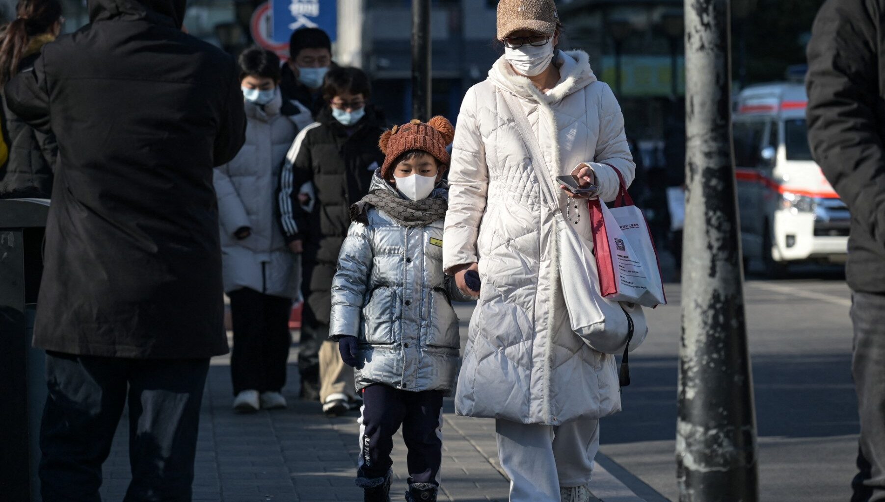 Flu activity drops in China, but authorities warn of potential virus risks amid holiday travel rush