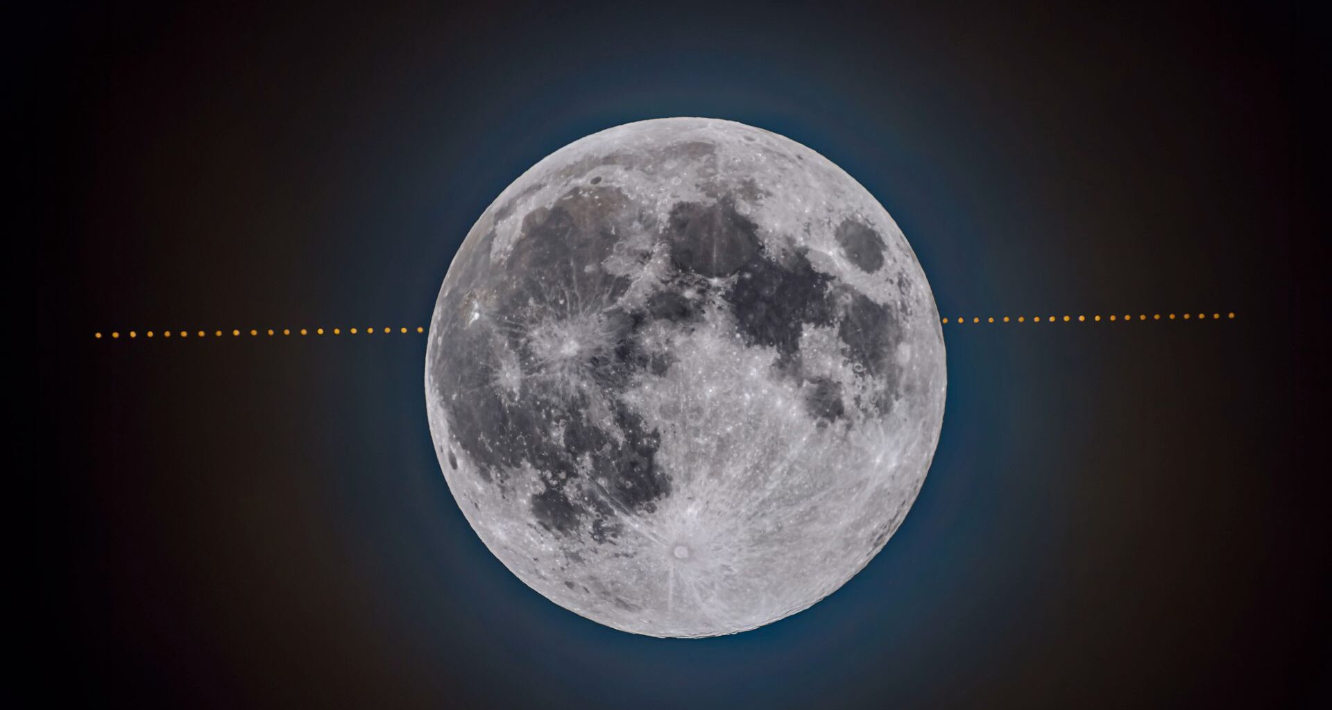 A bright closeup of the moon in space, showing its various maria, sits in front of a time lapse of a series of small orange dots as the planet Mars moves across the dark blue background