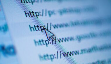 Cursor arrow pointing at URL on screen