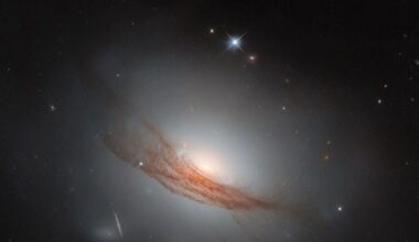 NGC 7722 is a lenticular galaxy about 185 million light-years away. The Hubble captured this image when following up on a supernova that was detected here in 2022. The supernova isn't visible in the image, but this dramatic portrait doesn't need an exploding stellar diva to capture out attention. Image Credit: ESA/Hubble &amp; NASA, R. J. Foley (UC Santa Cruz), Dark Energy Survey/DOE/FNAL/DECam/CTIO/NOIRLab/NSF/AURA; Acknowledgment: Mehmet Yüksek