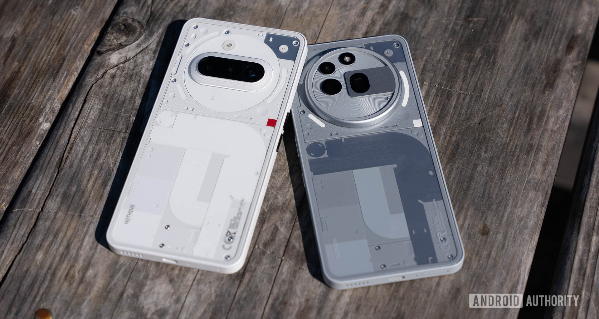 Nothing Phone 3a and Phone 3a Pro flat on a table