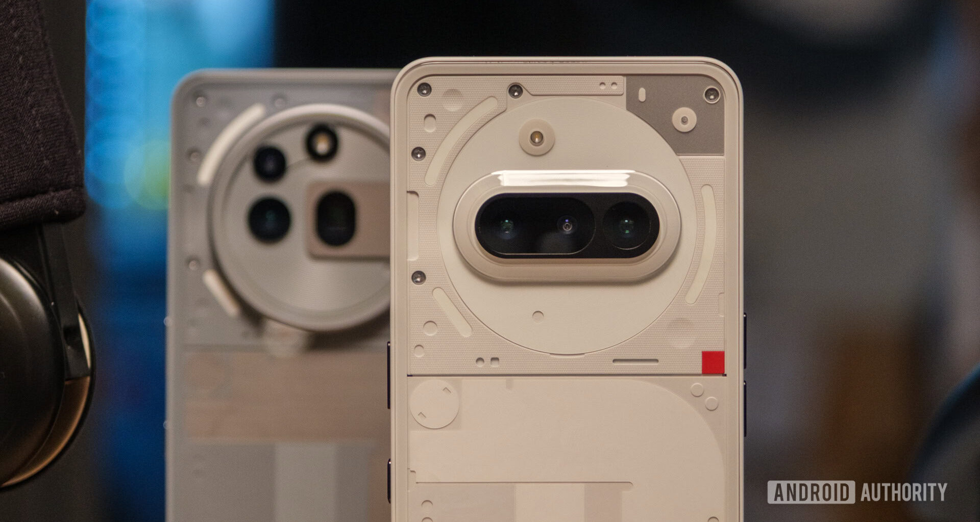 Nothing Phone 3a cameras close up in front of 3a Pro