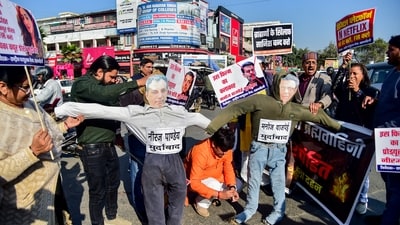 People under the banner of Rashtriya Parshuram Sena stage a protest against filmmaker Neeraj Pandey and actor Manoj Bajpayee over the title of their upcoming film Ghooskhor Pandat, in Prayagraj, Friday. (PTI Photo) (PTI)