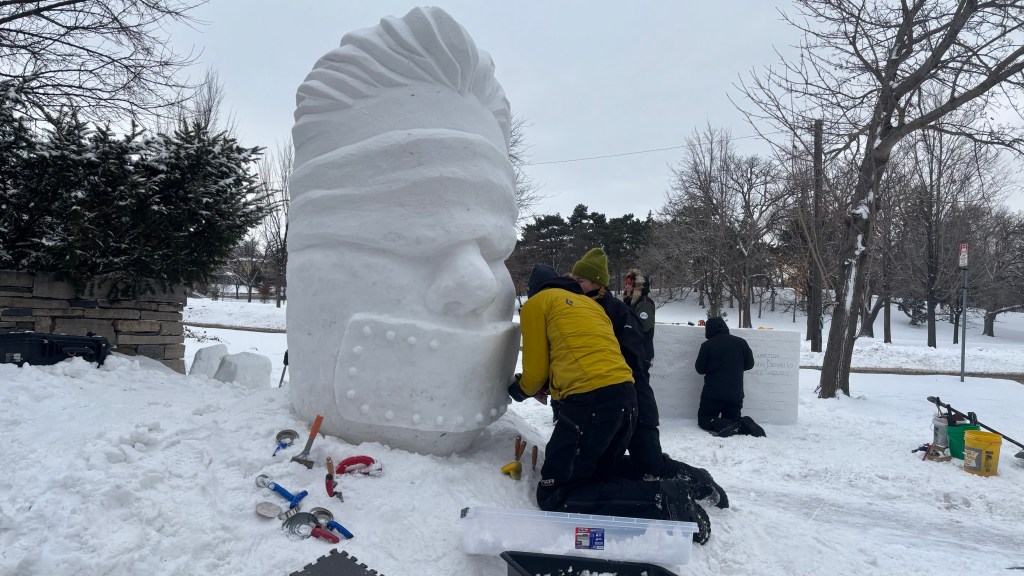 Snow sculptors recreate works after ICE messages destroyed