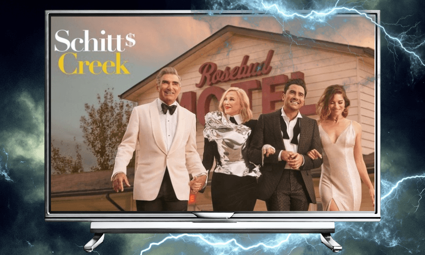 The promotional image for the TV show Schitt's Creek showing the four family members all dressed up outside their motel. The image is inside a TV frame and the background is stormy weather.