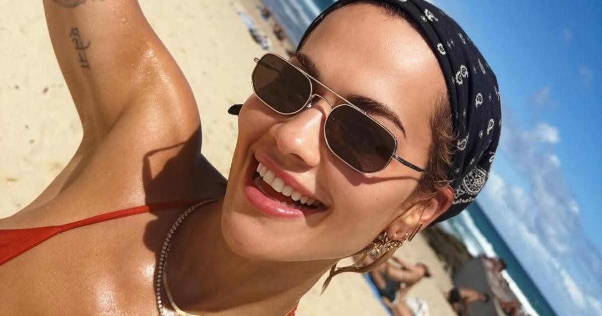 Rita Ora Radiant in Red Bikini as She Soaks Up Sunshine in Australia