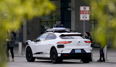 A Waymo vehicle parked on the street.