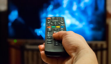 Watching tv and using remote control