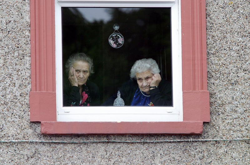 Ramelton ladies Chrissie Sandilands and Elizabeth Wilson casting an eye over the Lennon Festival carnival parade in 2004