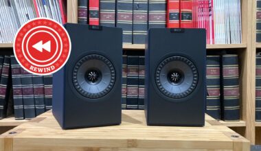 KEF speakers on table with Rewind logo