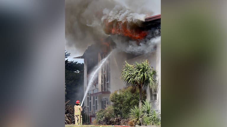 A firefighter battles a blaze at Taupo-nui-a-Tia College in Taupō.
