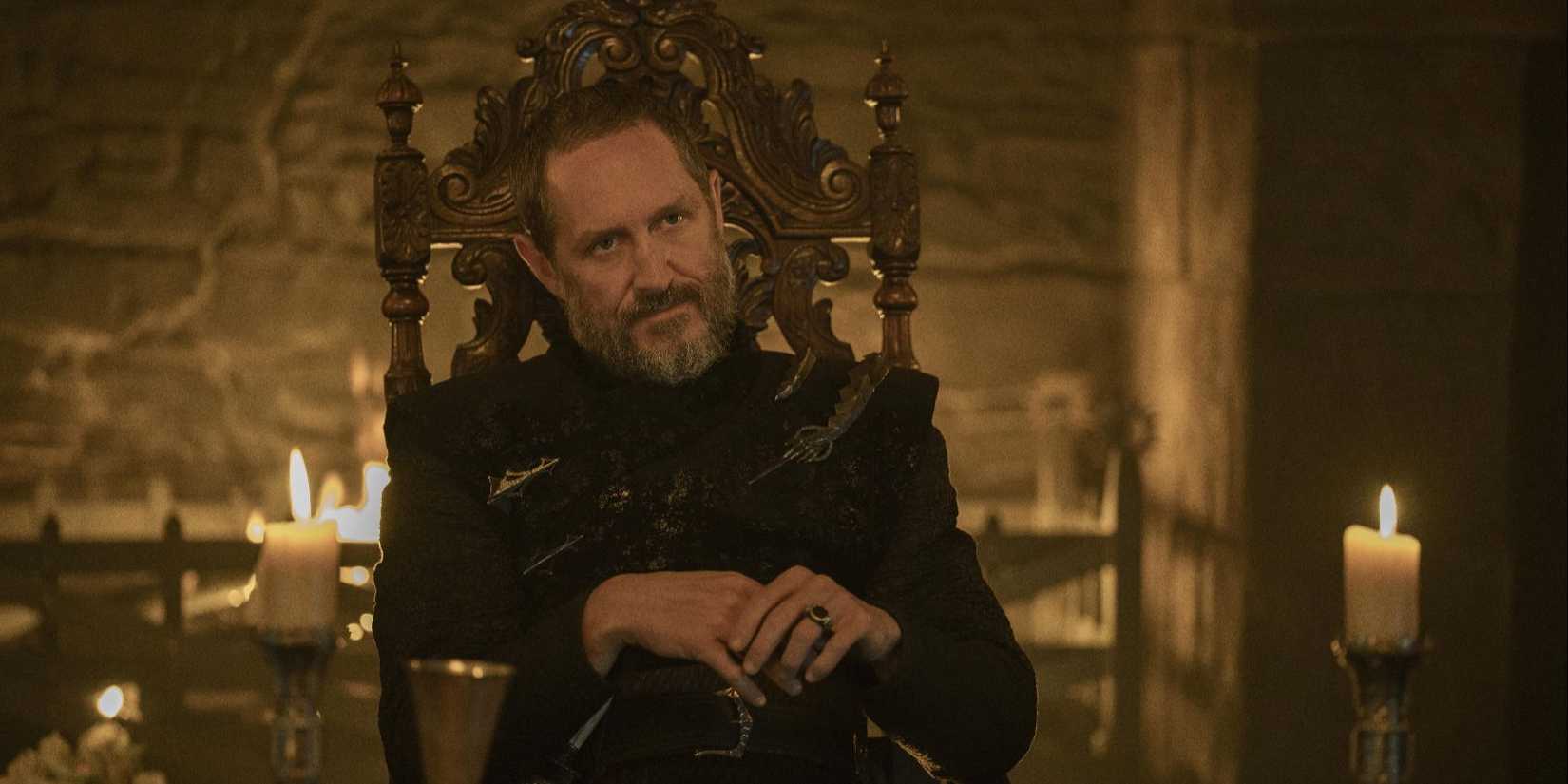 Baelor Targaryen (Bertie Carvel) sitting in his chair in A Knight of the Seven Kingdoms.