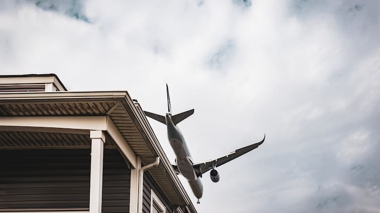 A plane flies over a property. (File image). 