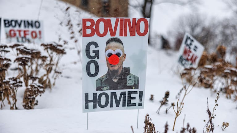 A poster reading "Bovino Go Home," featuring an altered image of U.S. Border Patrol Cmdr. Gregory Bovino.