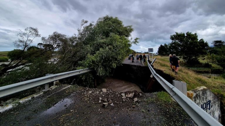 A washout on Lake Ferry Road has split families and left cut-off residents scrambling for supplies.