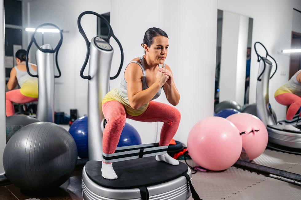 woman using a vibration plate