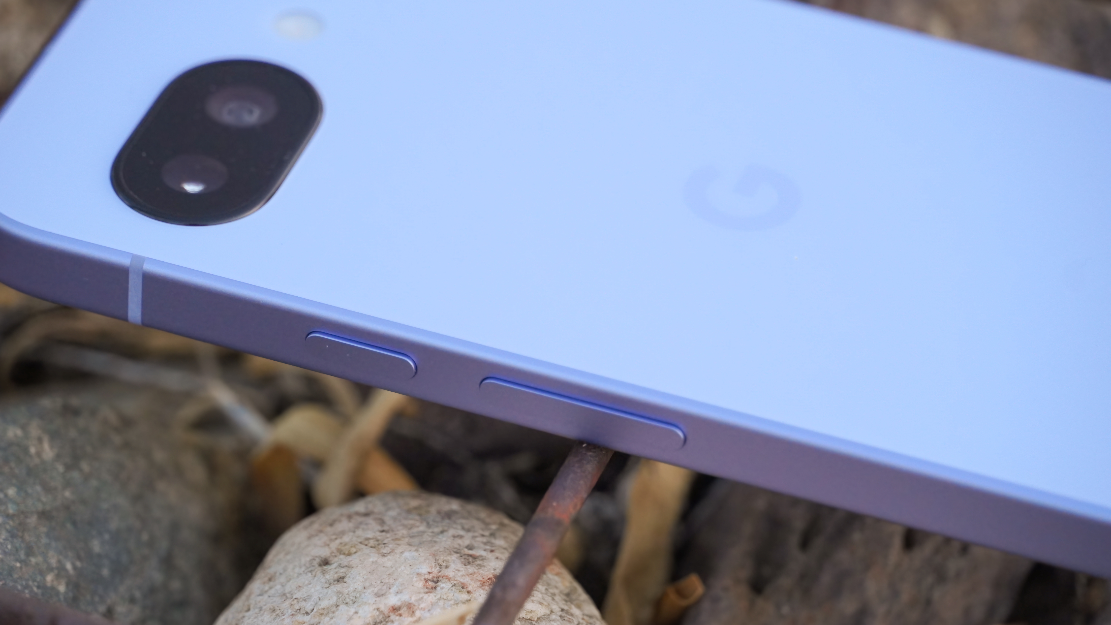The Google Pixel 9a in Iris on a rock fixture.