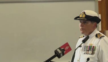 Navy commander not guilty in court martial over alleged kiss