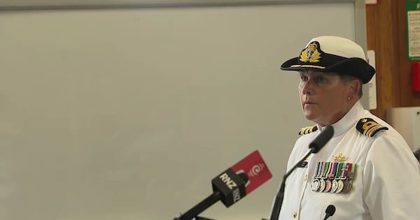 Navy commander not guilty in court martial over alleged kiss