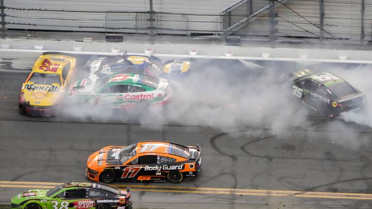 Cars crash on the checkered flag during the NASCAR Daytona 500 auto race at Daytona International Speedway